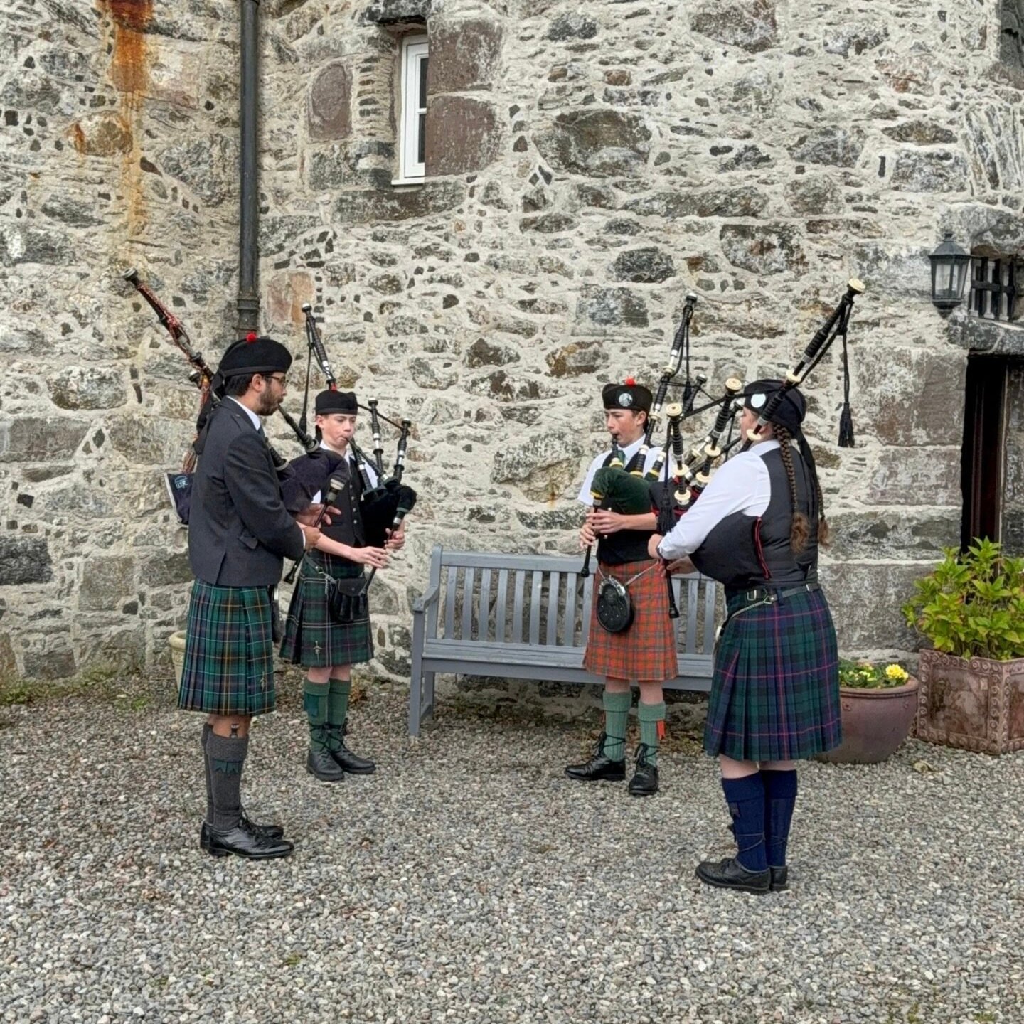 Performers playing at a castle wedding