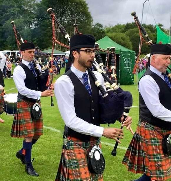 Aaron Playing with the Oban Pipe Band