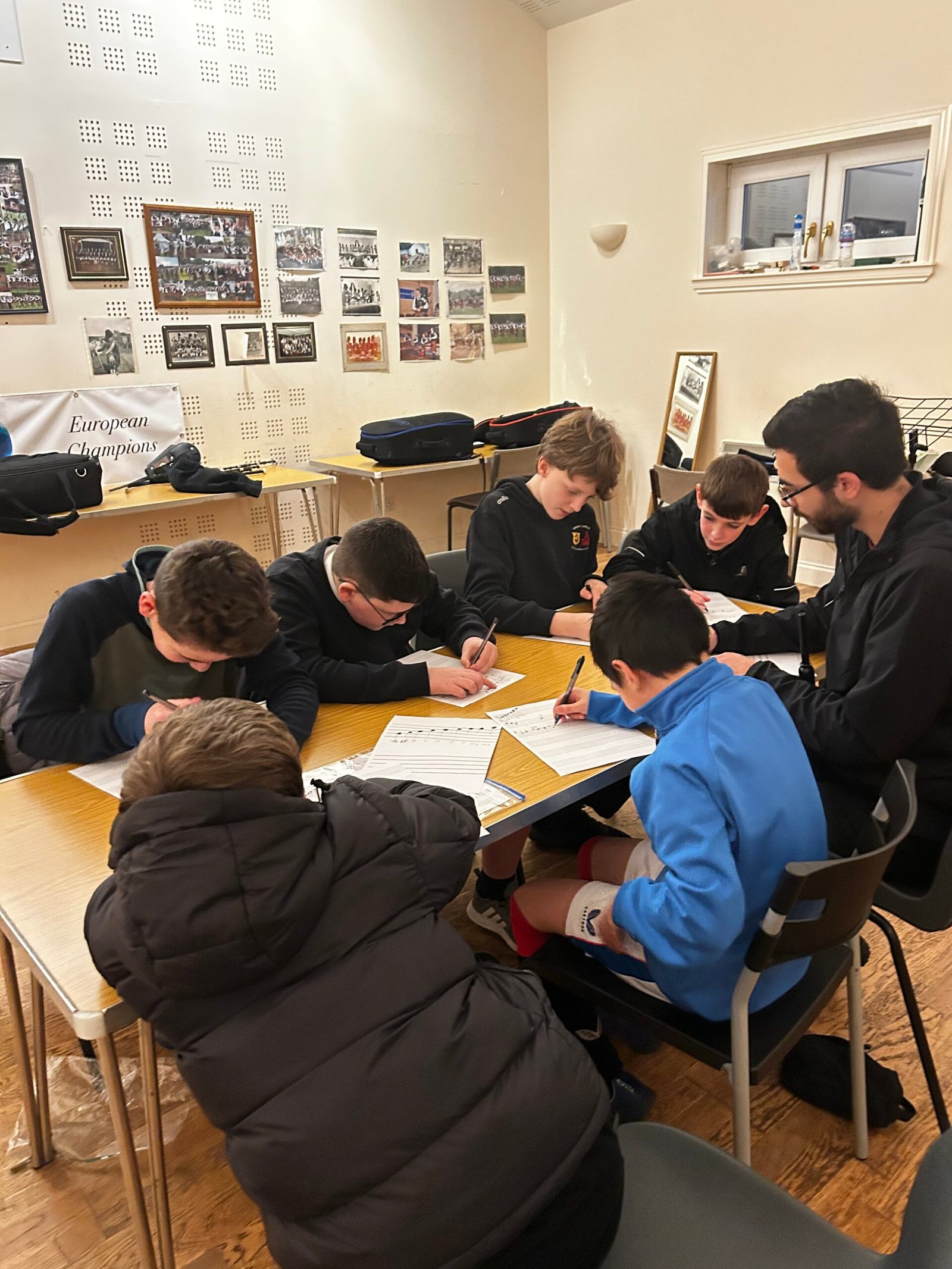 Young chanter players learning to write music